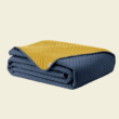 Kép 4/4 - Kék-sárga steppelt kétoldalas ágytakaró egyszemélyes ágyra (170x210) 